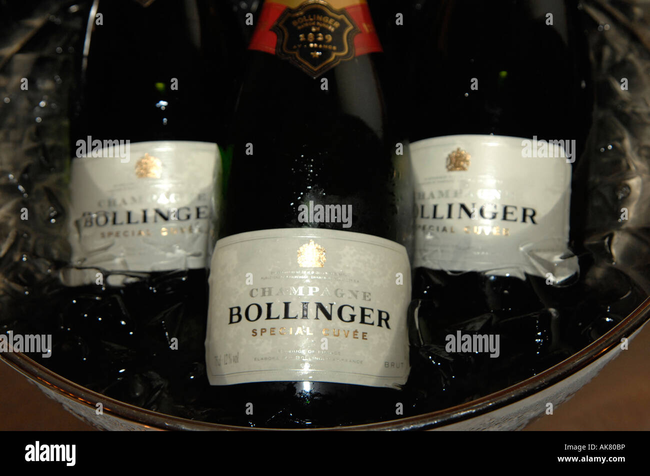 Bollinger Champagne being chilled in ice bucket Stock Photo
