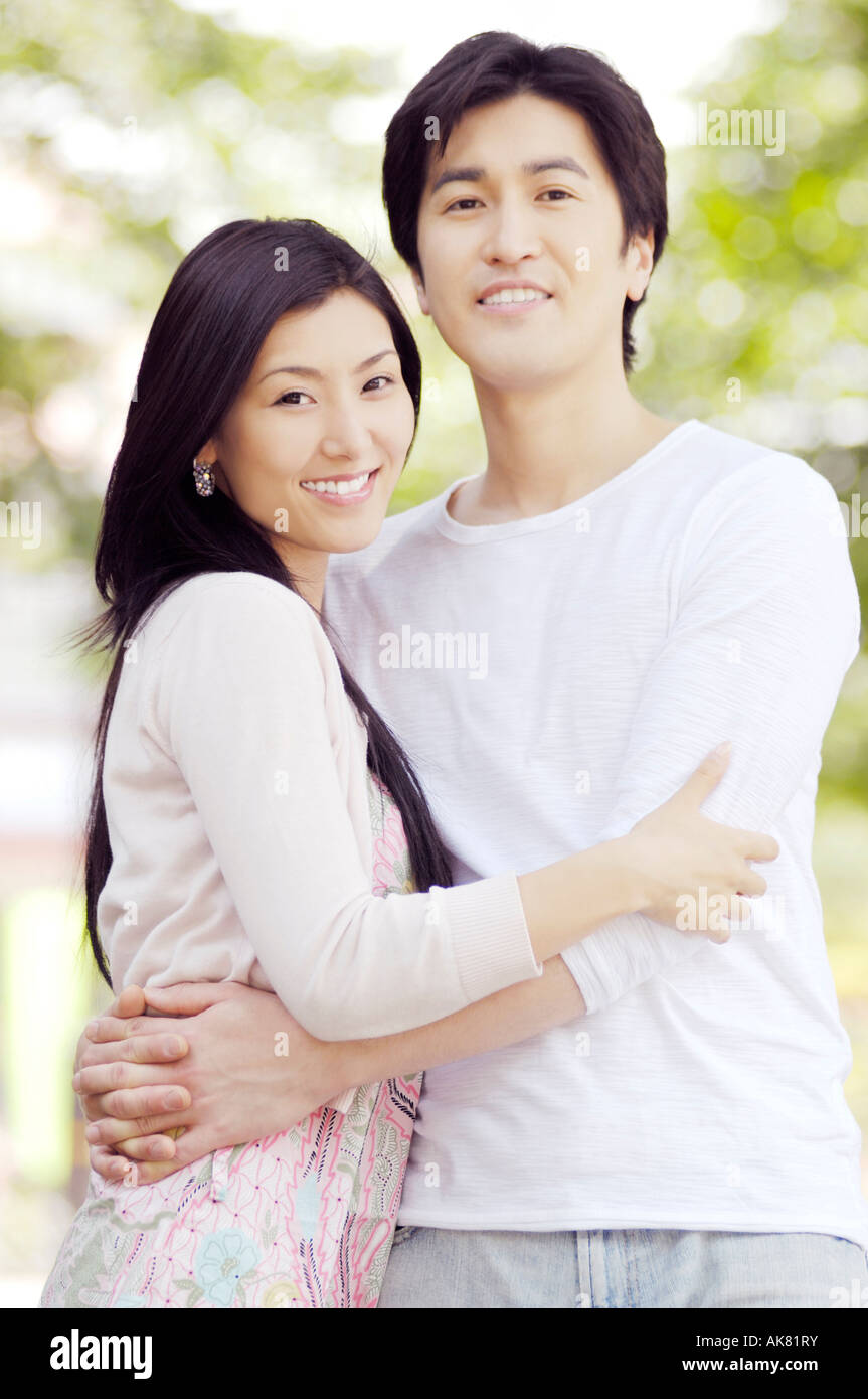 Woman man hug smile hi-res stock photography and images - Alamy