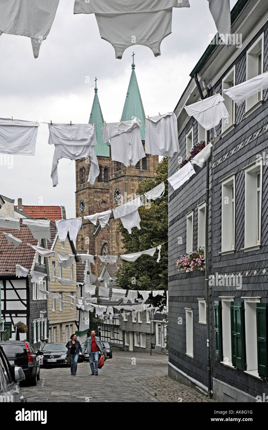 tradional festive day in Schwelm with white laundry hanging in the street, Germany, North Rhine-Westphalia, Ruhr Area, Schwelm Stock Photo