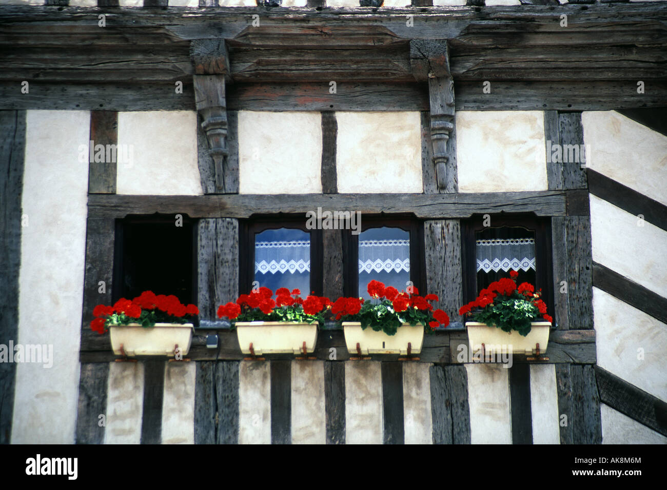 Window of old timbered building in Vannes, France Stock Photo