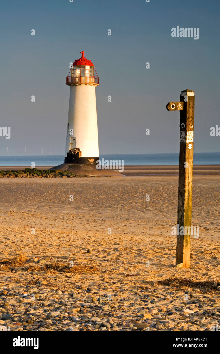 Public Footpath Signpost and The Point of Ayr or Talacre Lighthouse, Point of Ayr, Flintshire, North Wales, UK Stock Photo