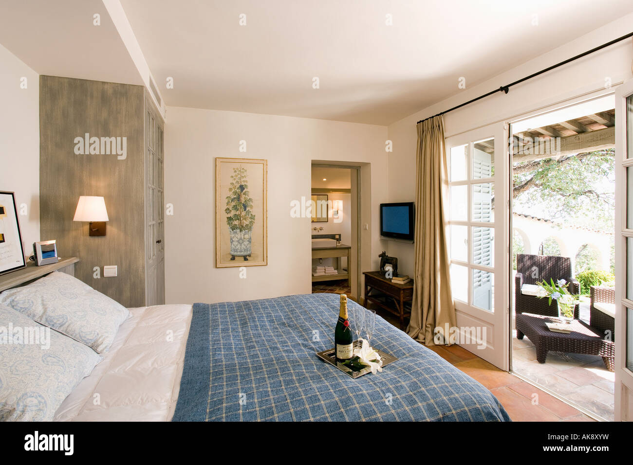 Open French Doors With View Of Patio In Modern Bedroom In Seaside Villa In France Stock Photo Alamy