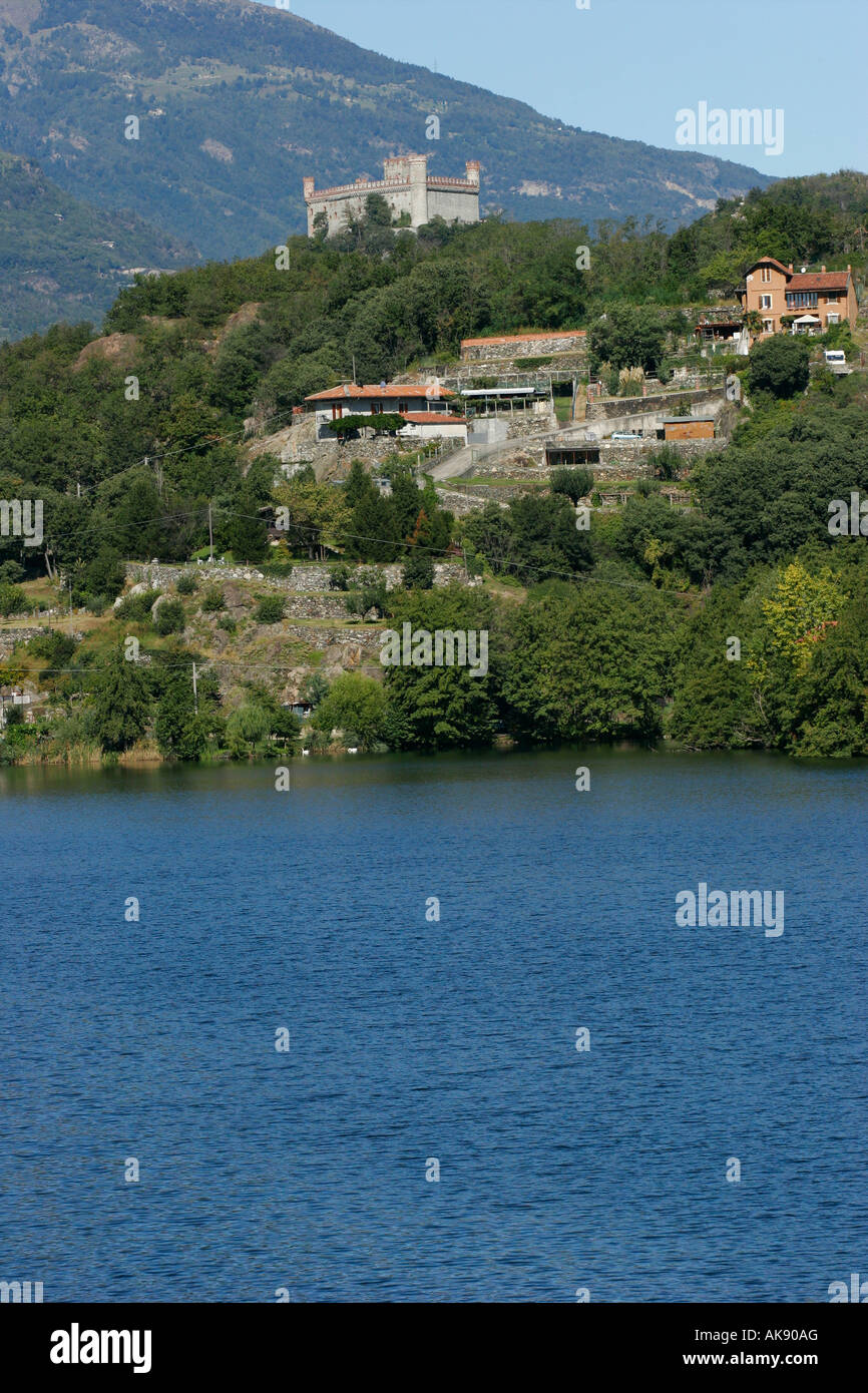 Montalto Dora castle and Pistono lake in the Canavese (Ivrea, Turin, Piedmont, Italy) Stock Photo