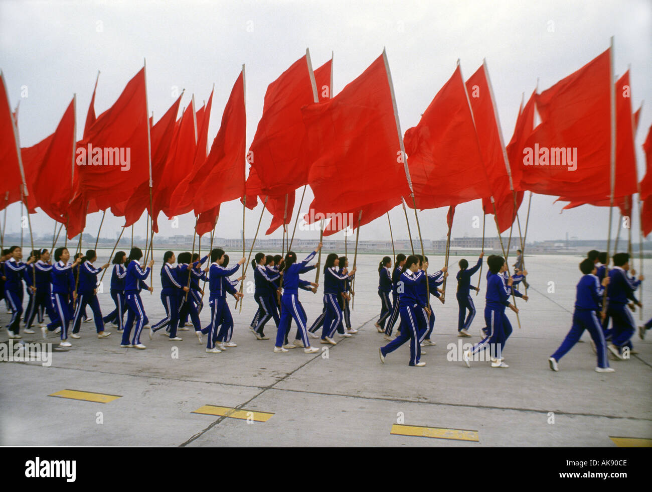 Chinese Teenagers Carry Red Flags To Welcome A Vip Visitor At Canton Airport China Photo By Terry Fincher Stock Photo Alamy Chinese Teenagers Carry Red Flags To Welcome A Vip Visitor At Canton Airport China Photo By Terry Fincher Stock Photo Alamy