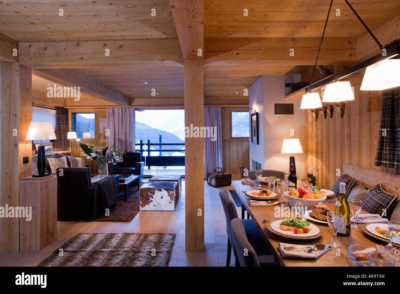 Pendant Lighting Over Table With Place Settings Food In