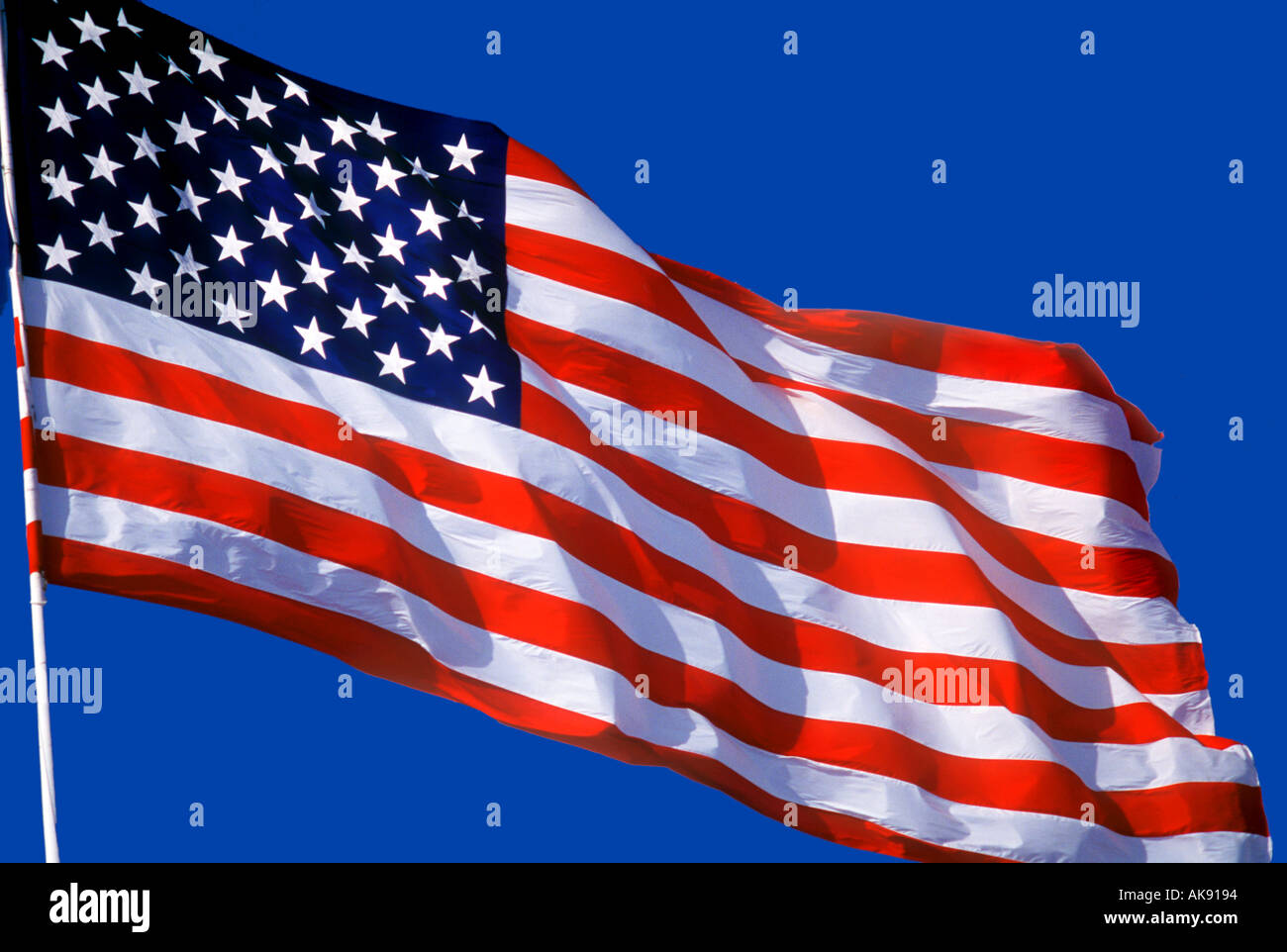 american usa stars and stripes flag blowing in wind Stock Photo Alamy