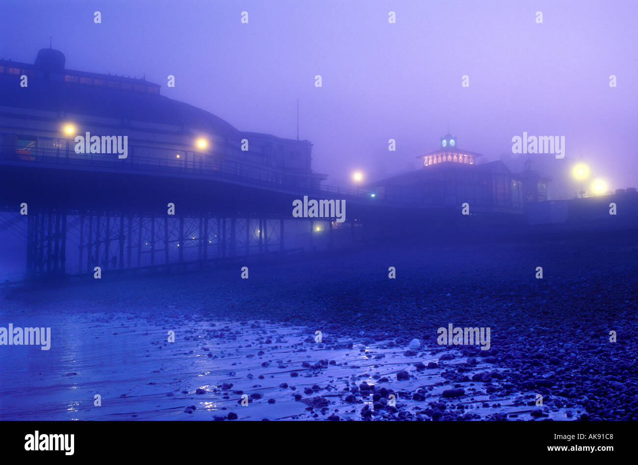eastbourne pier night sea mist east sussex england uk Stock Photo Alamy