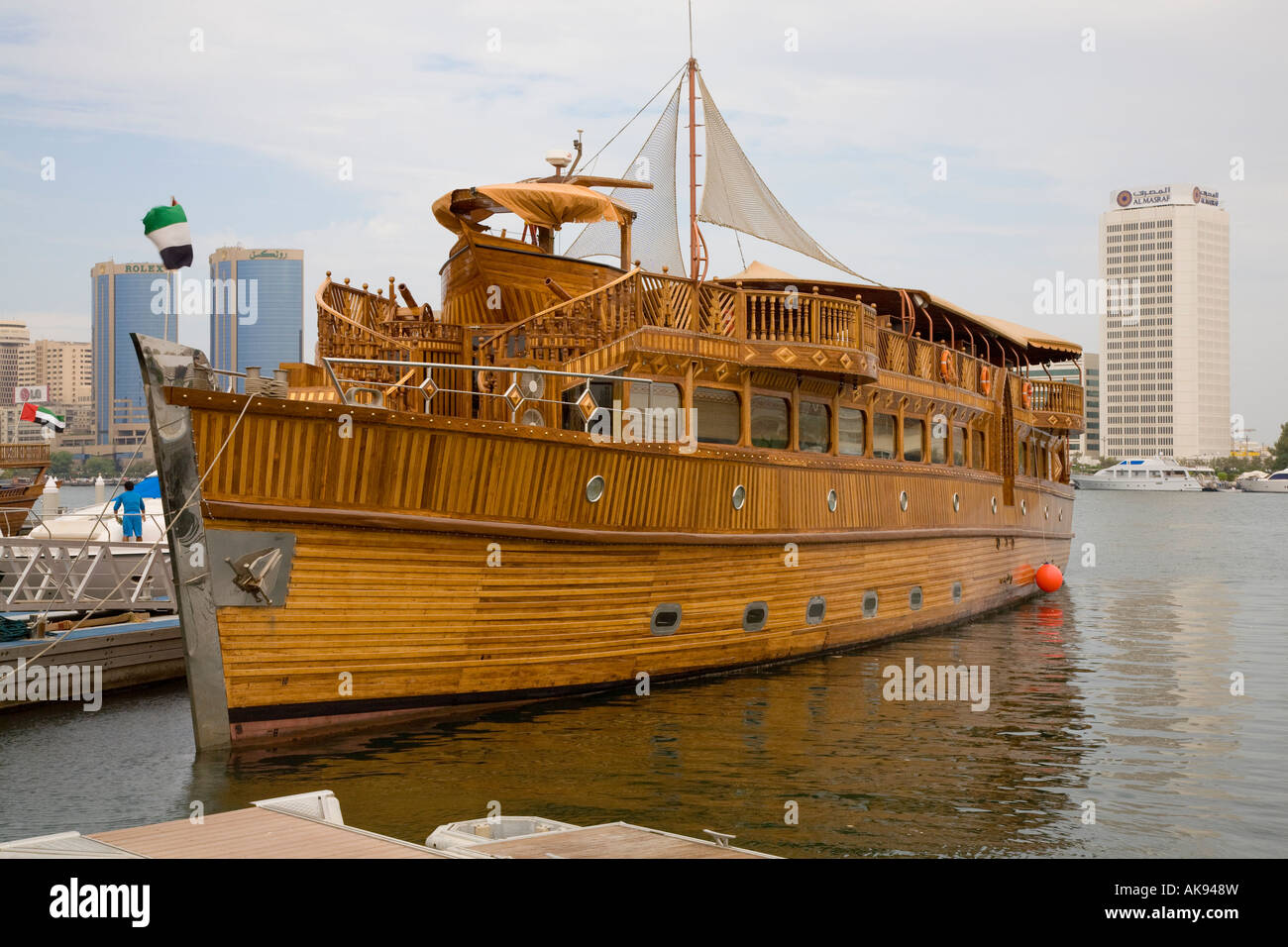 Sleek stylish handbuilt wooden arabian sailing boat in Dubai Creek and