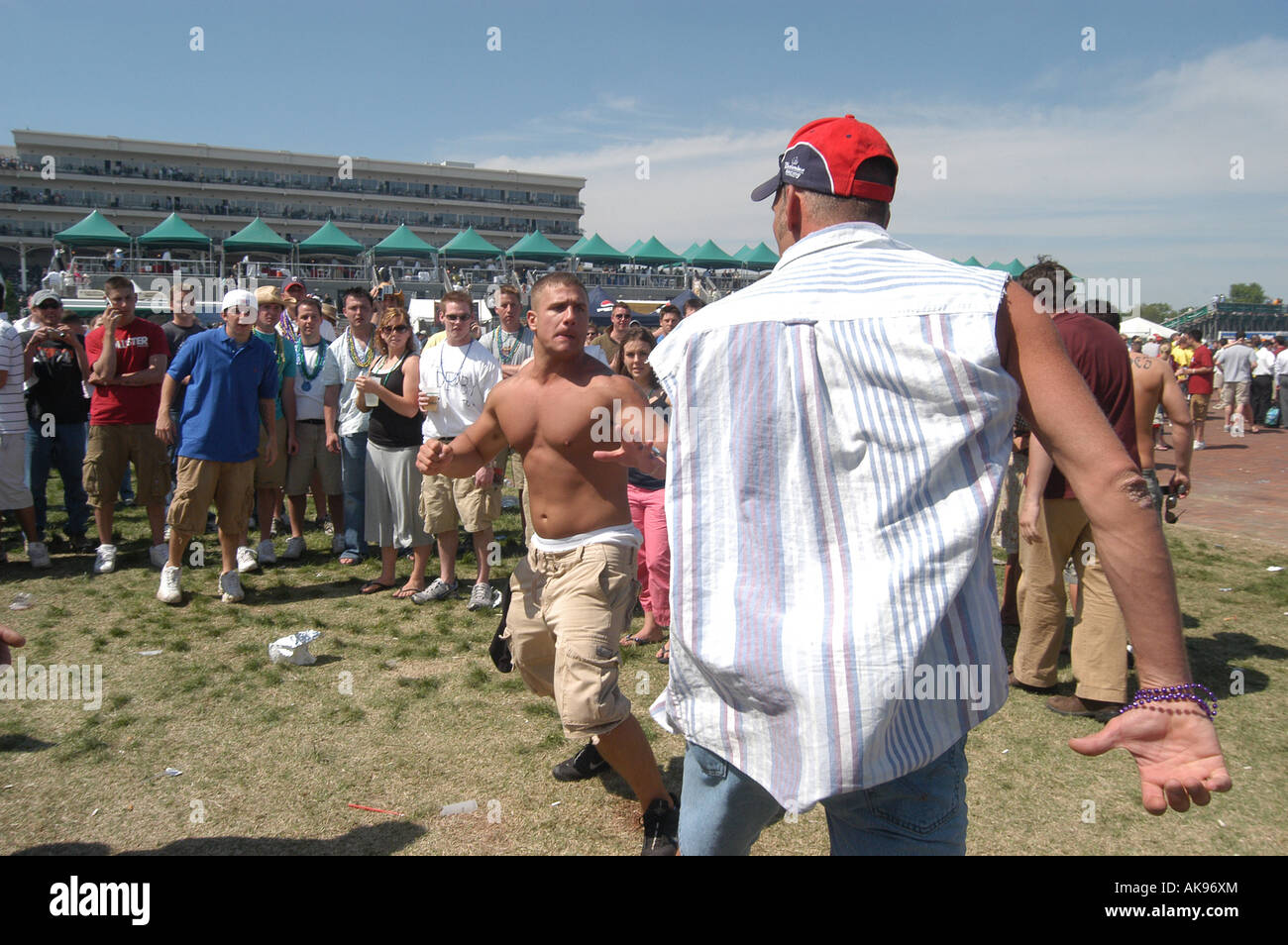 Fighting in the infield of Kentucky Derby Stock Photo Alamy