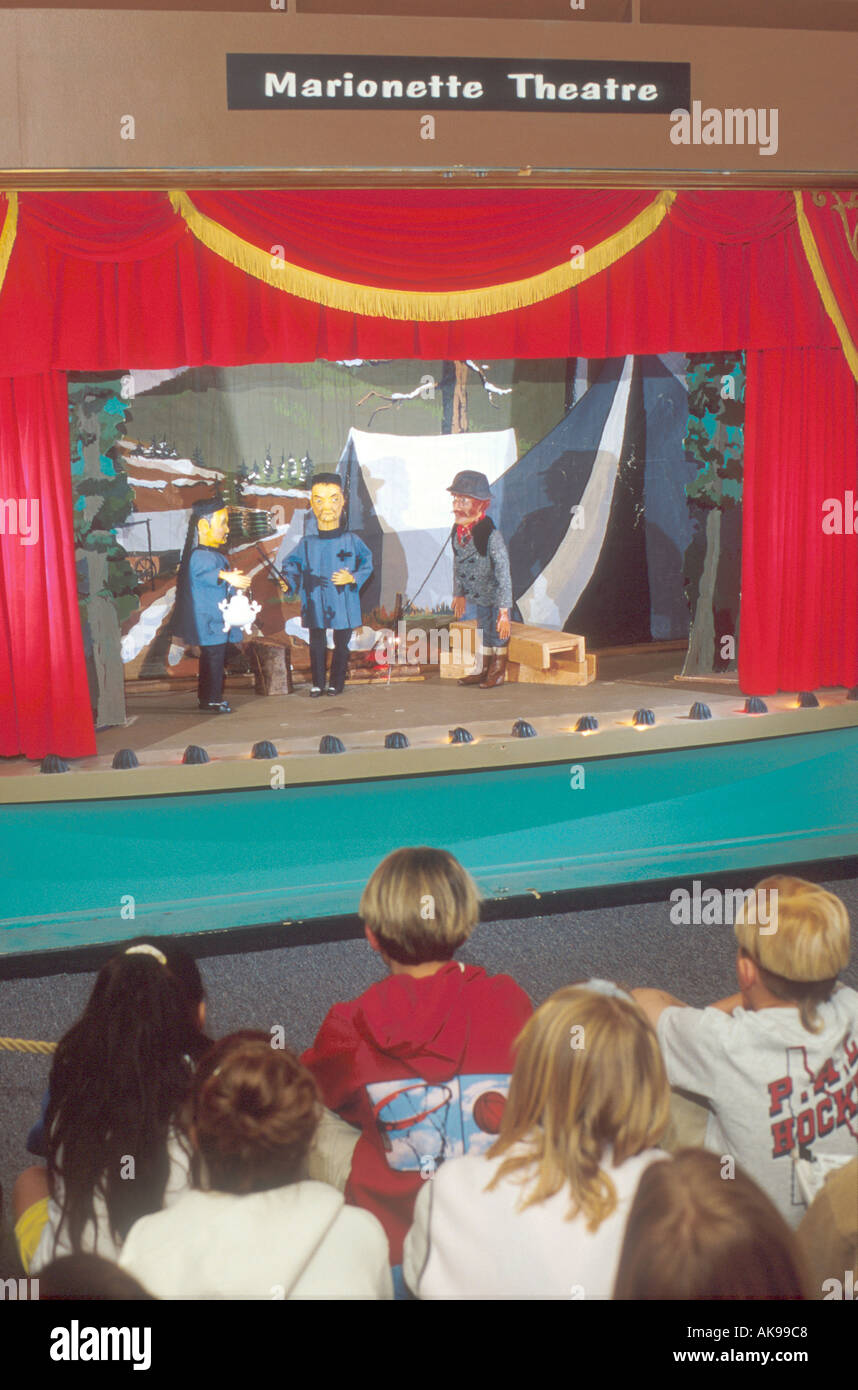 Children watch puppet show Stock Photo Alamy