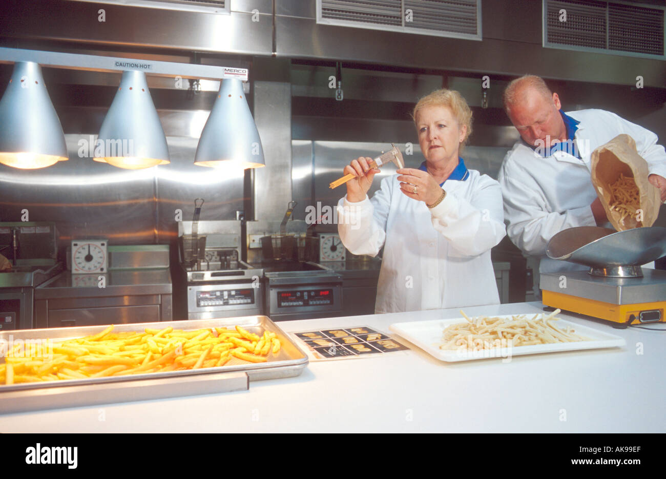 French fry quality control Stock Photo Alamy