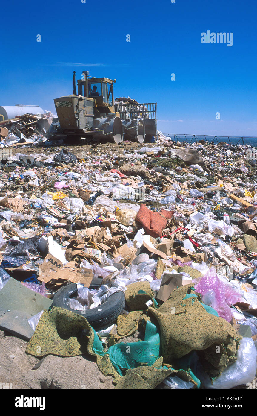 Sanitary landfill with compactors at work Stock Photo Alamy