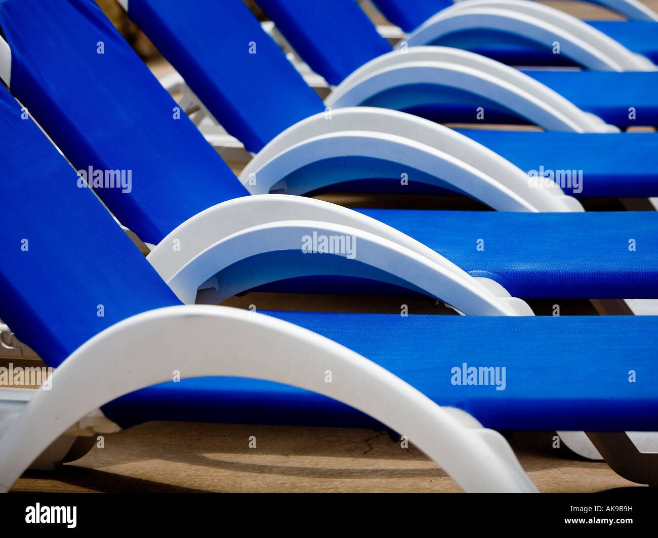 blue and white pool chairs Stock Photo Alamy