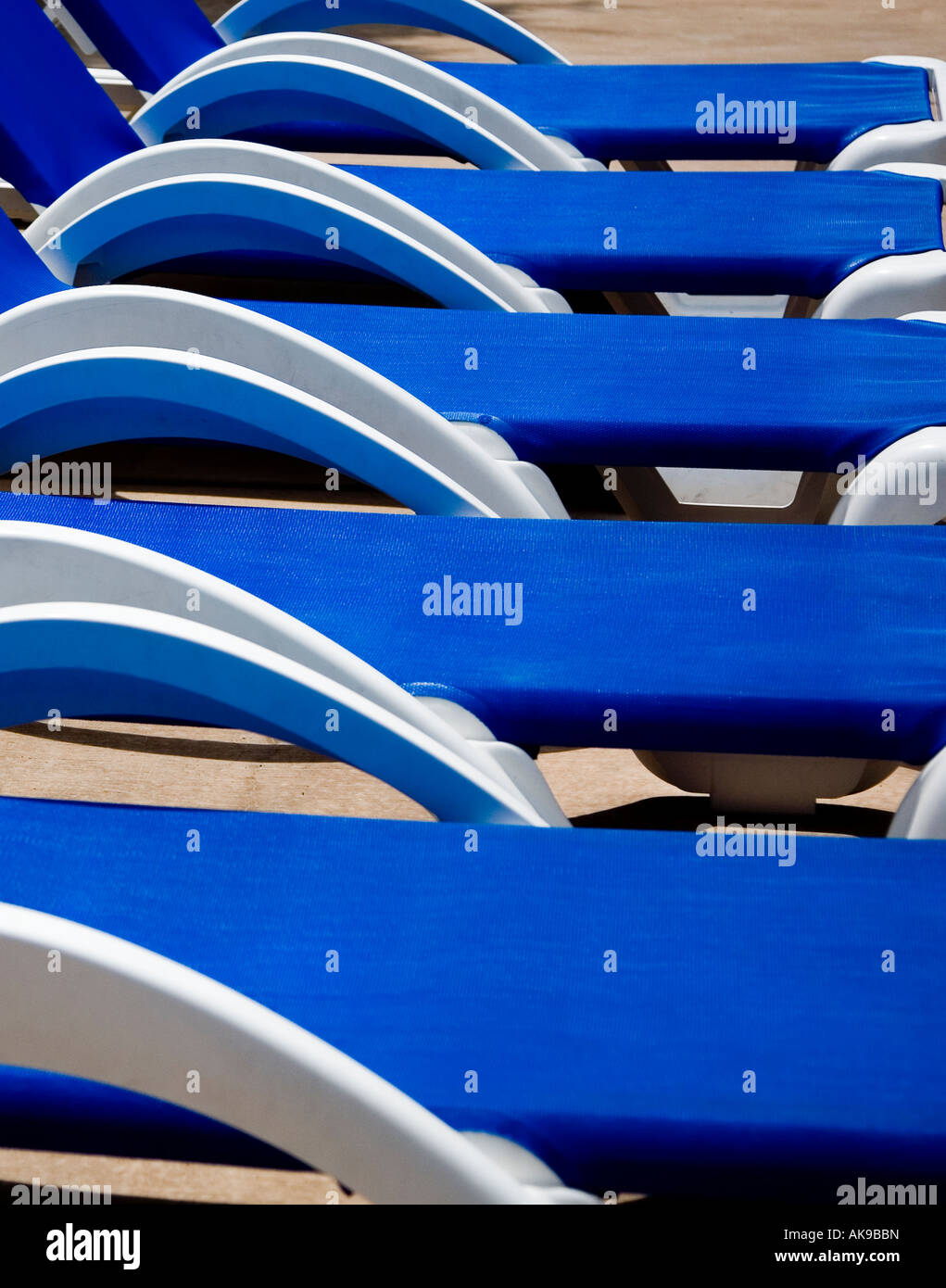 blue and white pool chairs Stock Photo Alamy