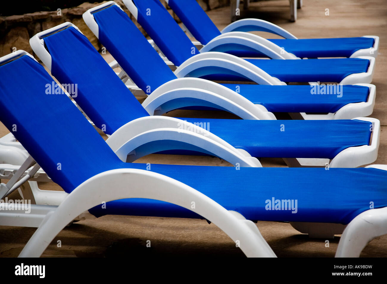blue and white pool chairs Stock Photo Alamy