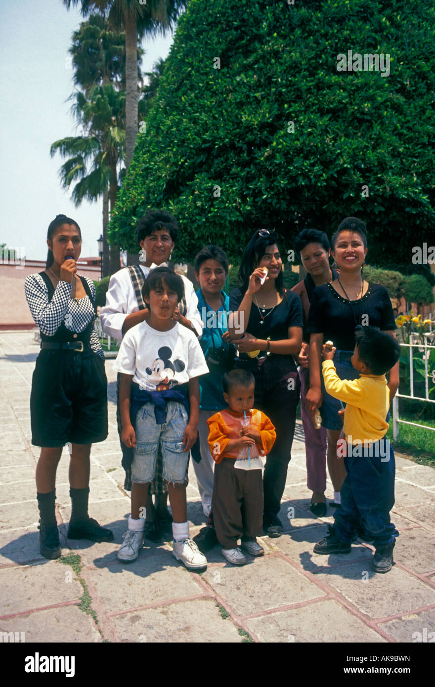 Mexican people, Mexican family, family, eye contact, front view, portrait, Plaza Principal, Bernal, San Sebastian Bernal, Queretaro State, Mexico Stock Photo