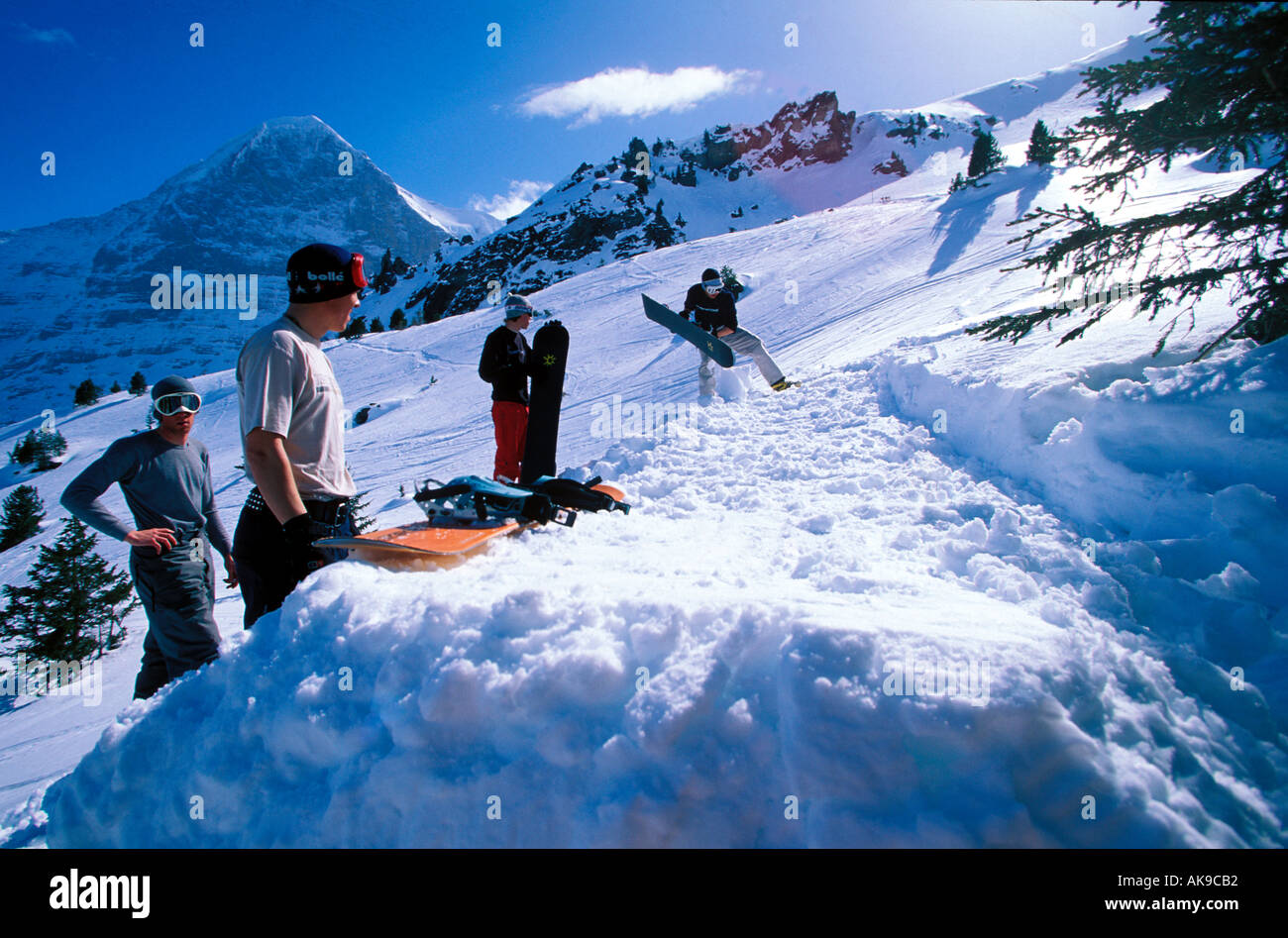 Group of snowboarders preparing a jump at Grindelwald Switzerland