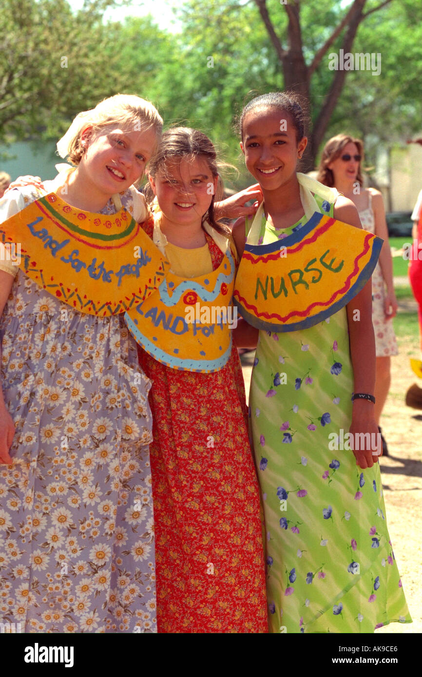 Black and white youth activists age 12 at the In the Heart of the Beast May Day Festival. Minneapolis Minnesota USA Stock Photo