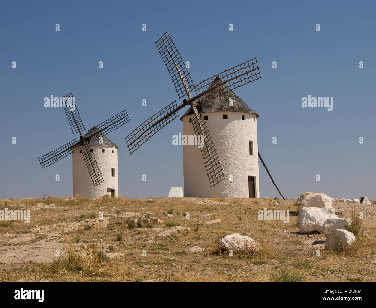 Two windmills at Campo de Criptana (Ciudad Real, Spain) Quixote's land. Stock Photo
