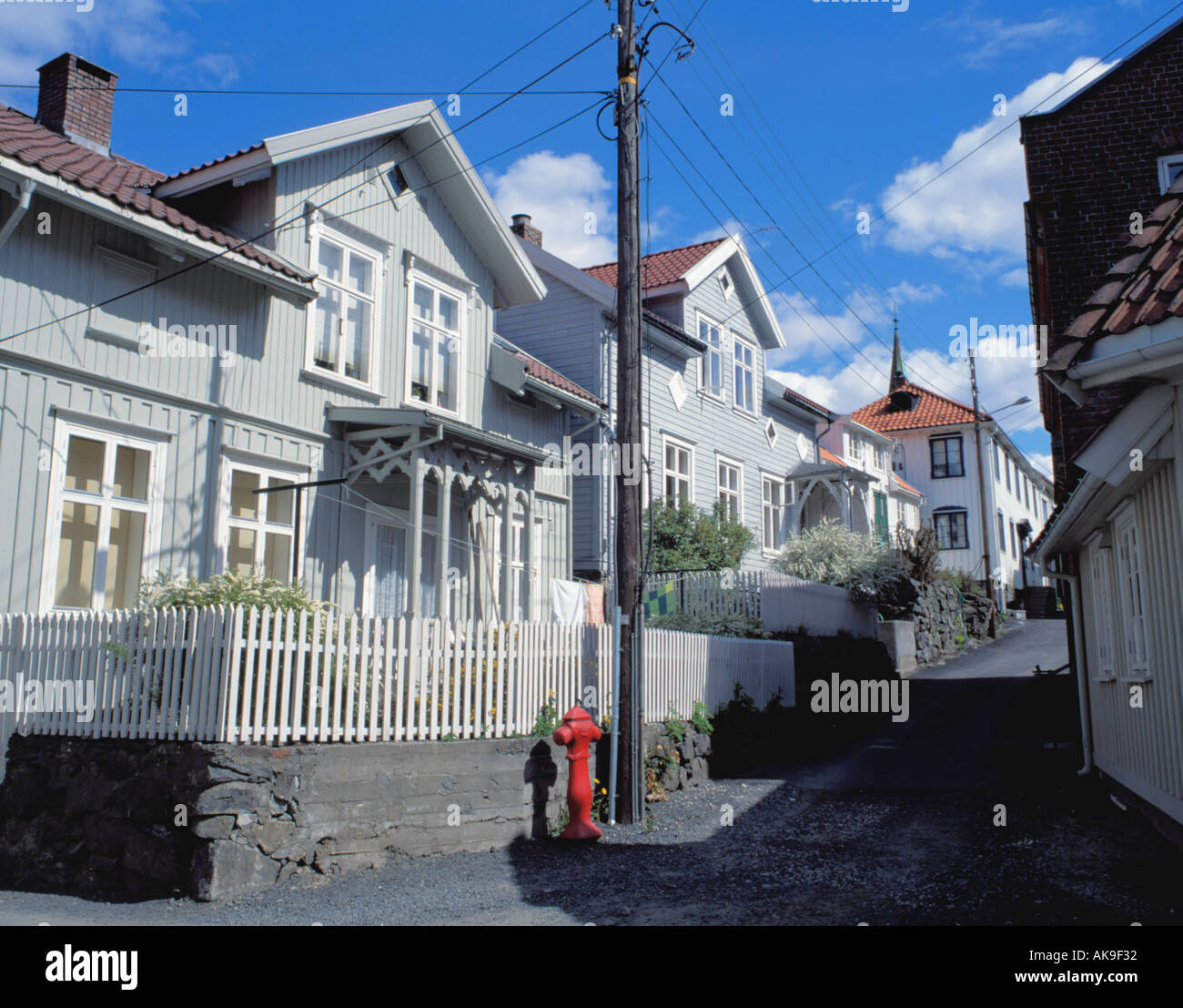 Picturesque pretty old painted timber houses in a back street, Kragerø, Telemark, Norway. Stock Photo