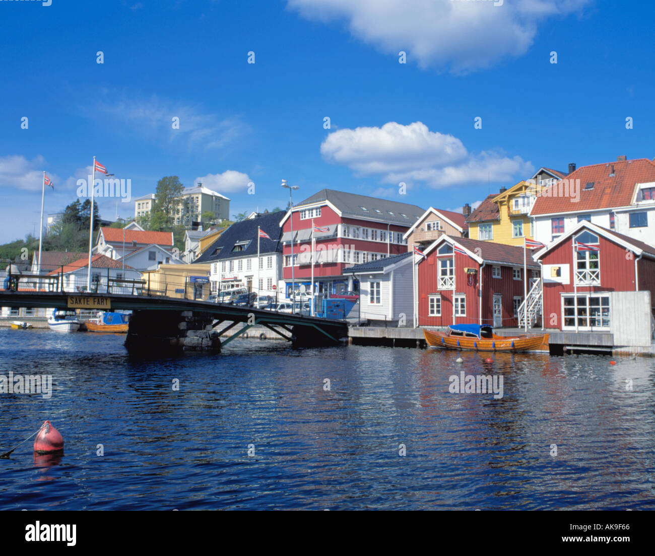 Brightly painted picturesque traditional old timber waterfront buildings, Kragerø, Telemark, Norway. Stock Photo