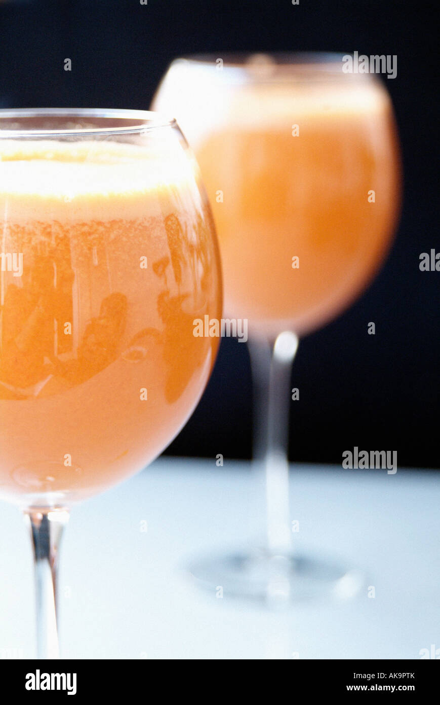 A pair of orange juice cups Stock Photo Alamy