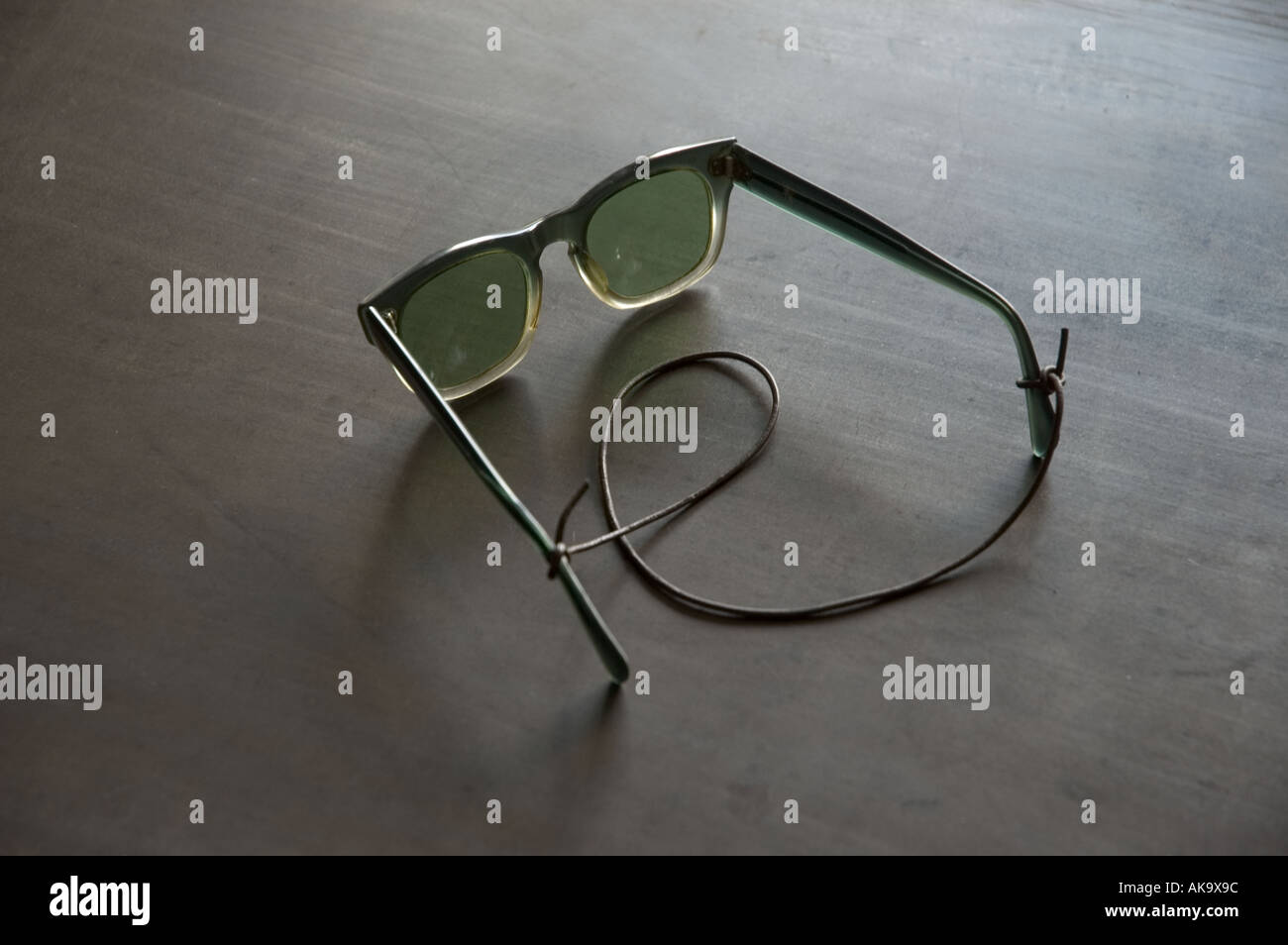Dark tinted safety glasses on table top Stock Photo Alamy