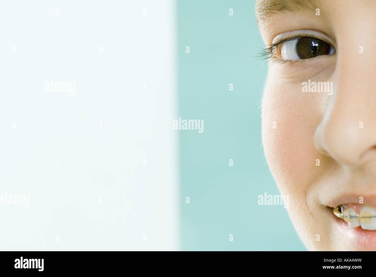 Cropped view of boy smiling at camera, portrait Stock Photo - Alamy