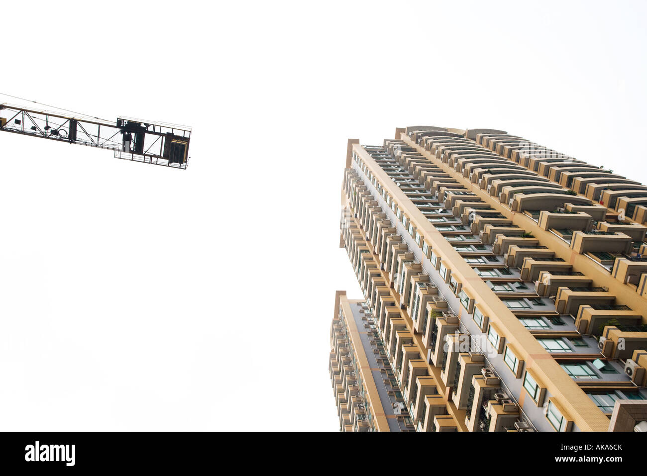 China, Guangdong Province, Guangzhou, high rise and crane Stock Photo