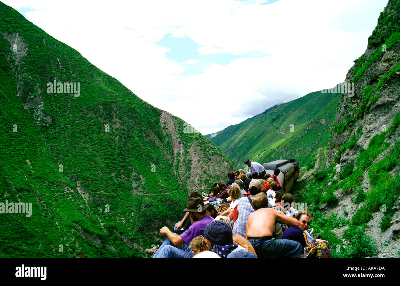 Tourists sitting on the roof. Train Riobamba Bucay. Ecuador Stock Photo