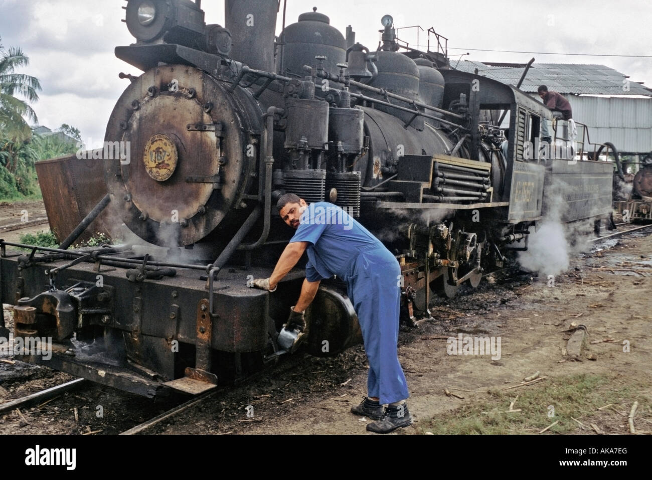 Old American steam engines are still in use at this Cuban sugar mill in