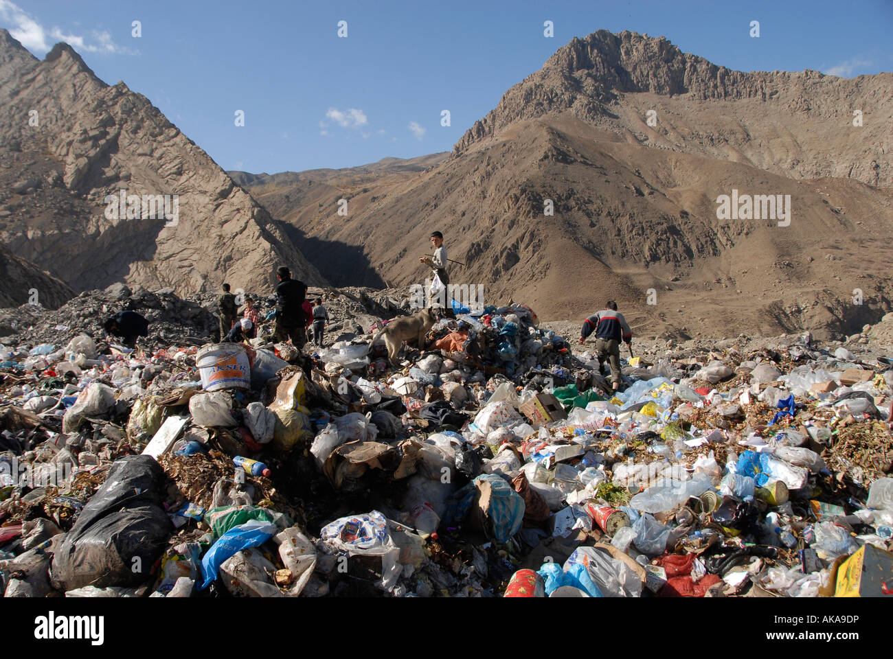 Scavenger looking for useful waste at a landfill site, Hakkari province. Eastern Turkey Stock