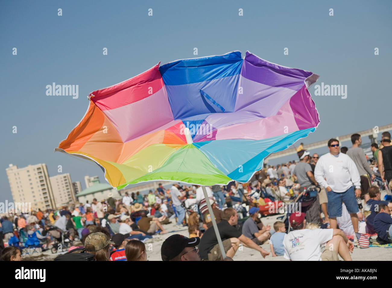 A colorful umbrella turned inside out with the wind during at