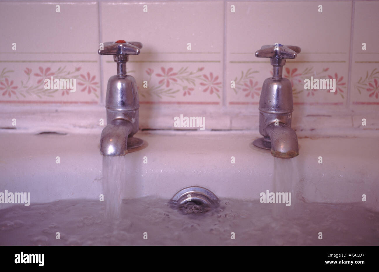 Water Taps Open in Bath Stock Photo
