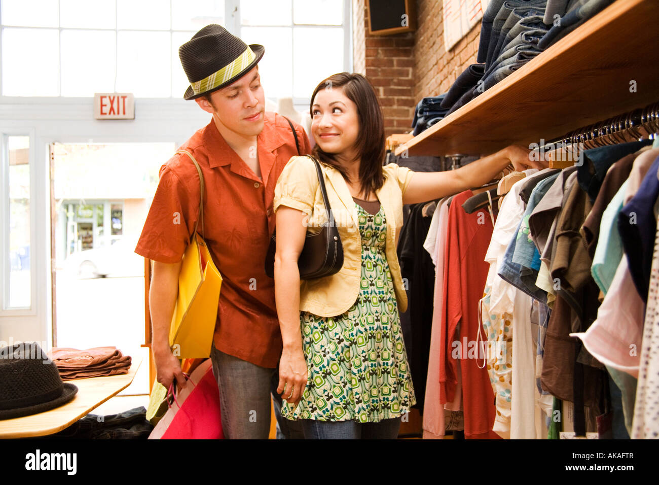 Man watching women in store hi-res stock photography and images - Alamy