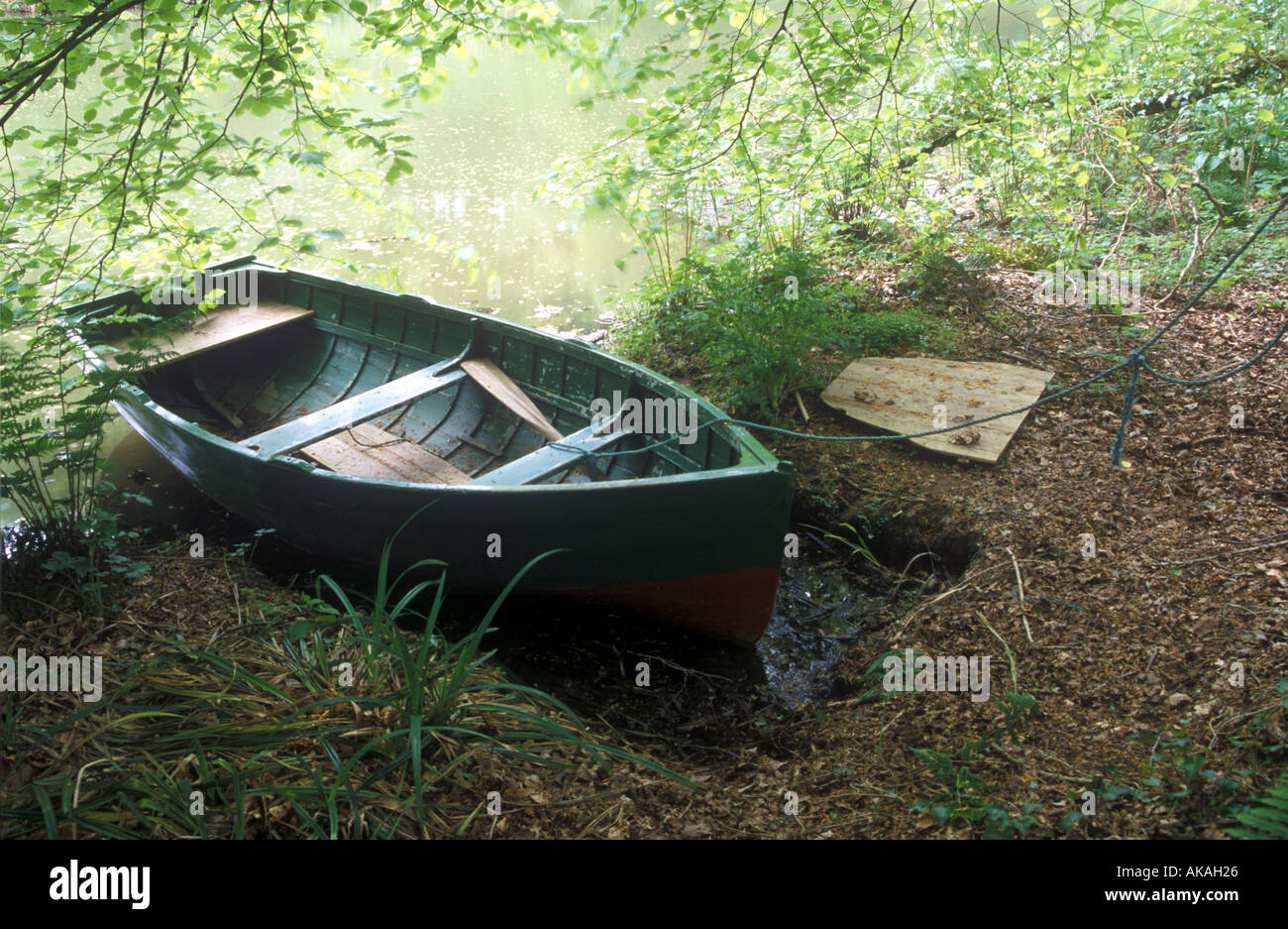 Wooden dinghy Heligan Cornwall Stock Photo