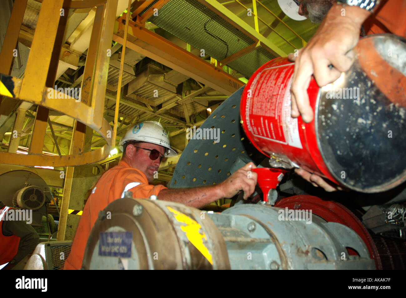 worker lubricating bearings electric motor mining dragline Central