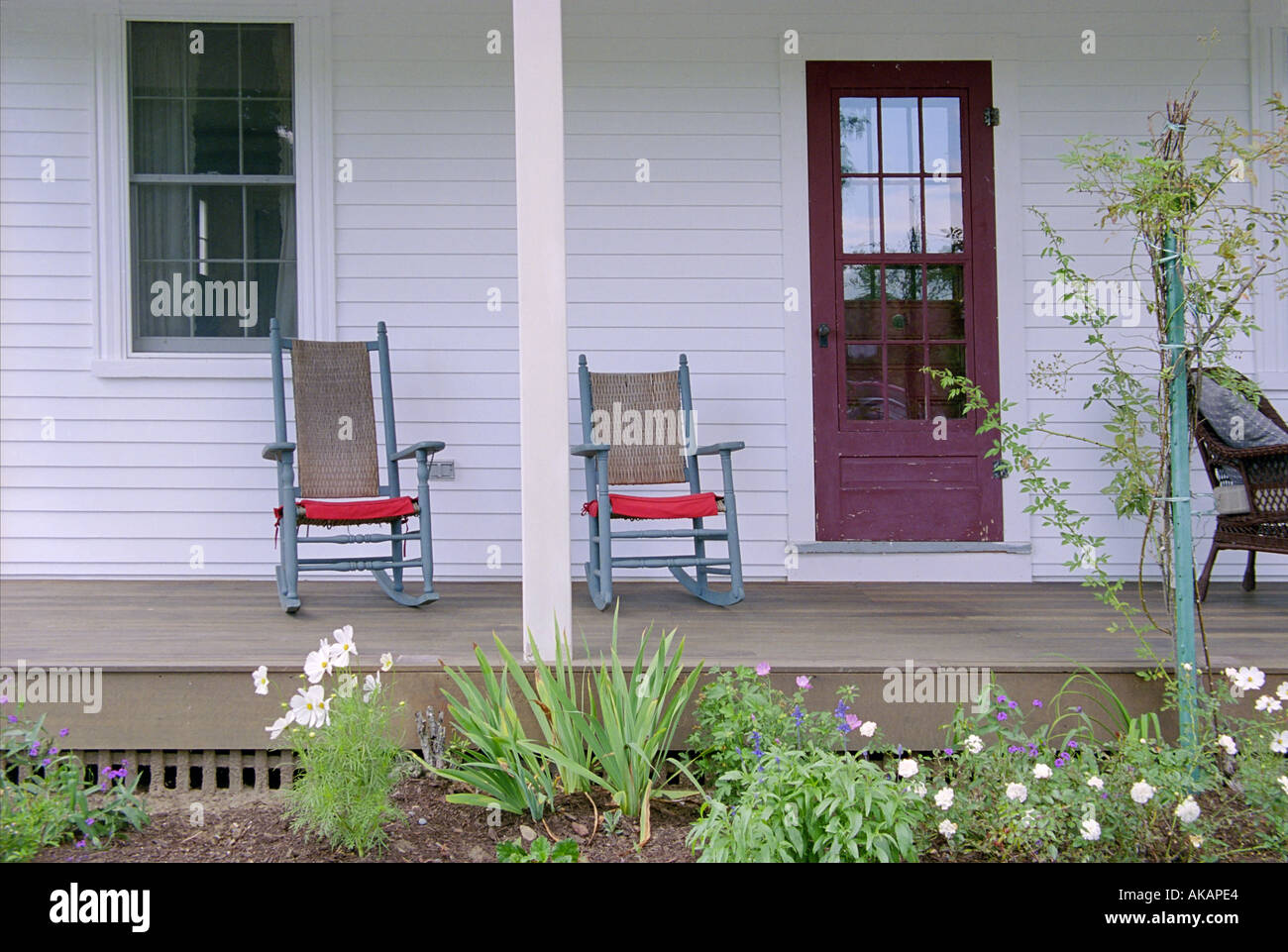 The front porch of a rural New England farmhouse Stock Photo