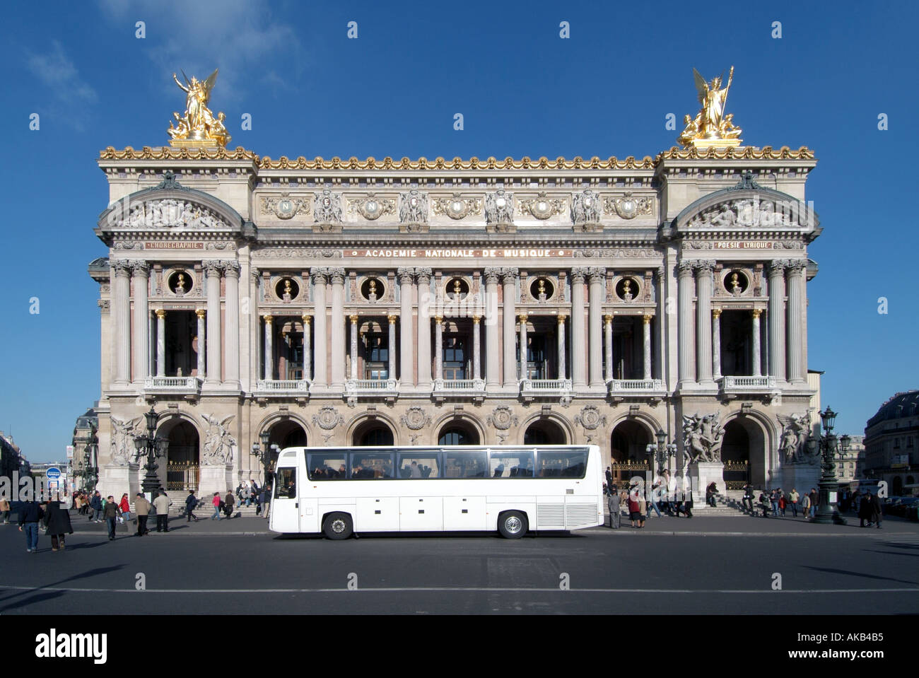 Paris Place de Opera sightseeing coach outside Charles Garniers Opera ...