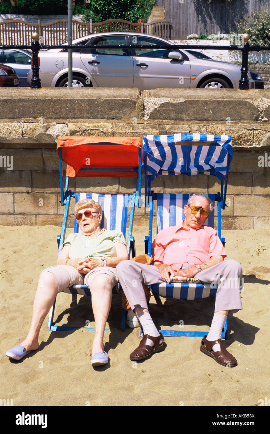England, Hampshire, Isle of Wight, Sandown, Elderly Couple Sleeping in