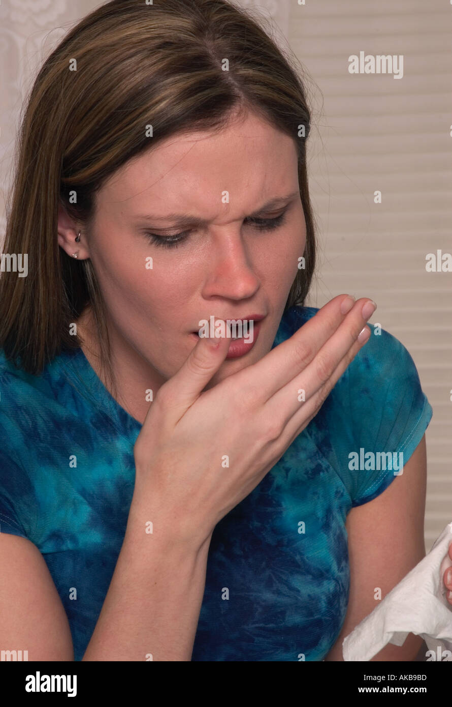 Teen Girl Sneezes USA Stock Photo
