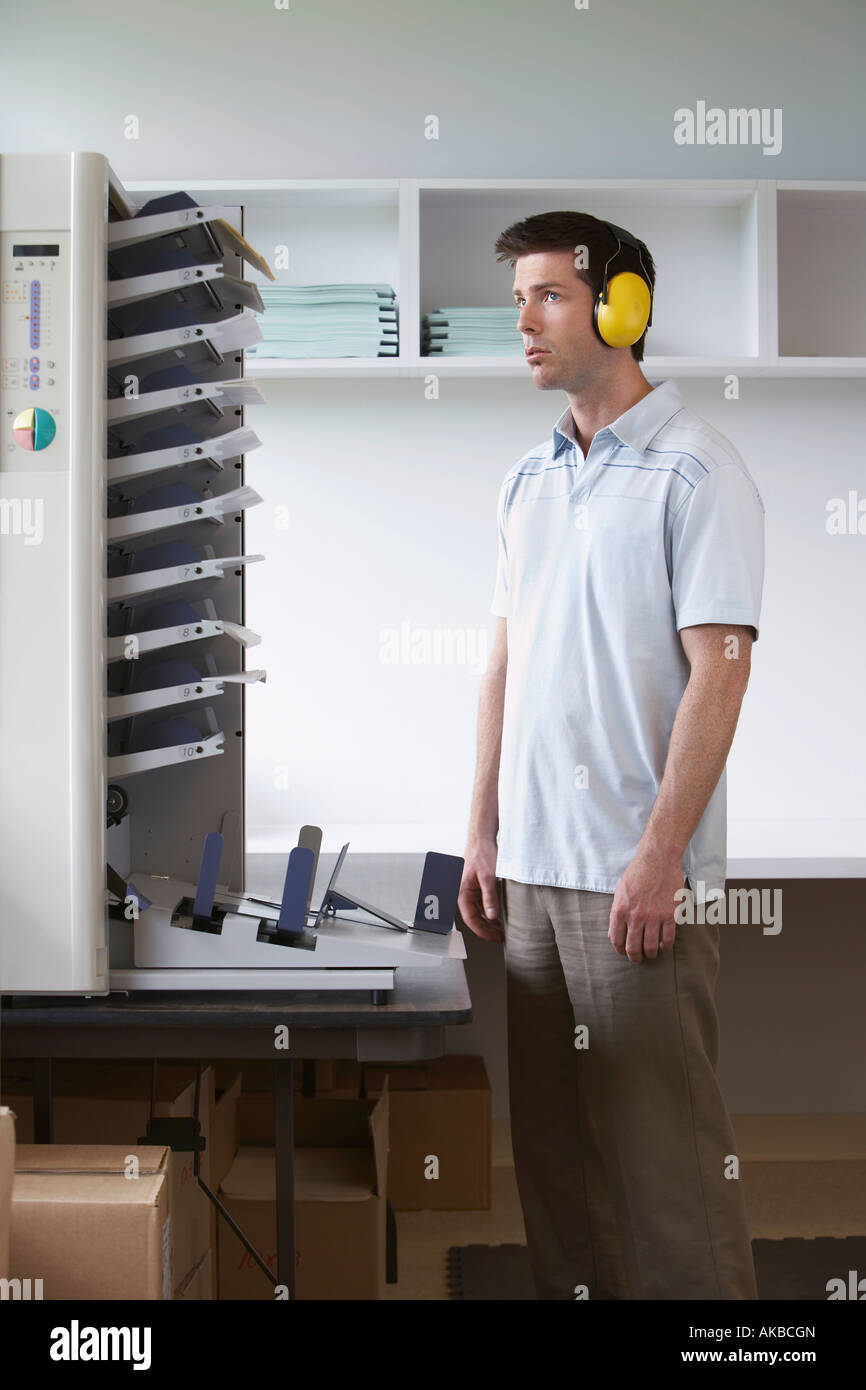 Office headphones noise hi-res stock photography and images - Alamy