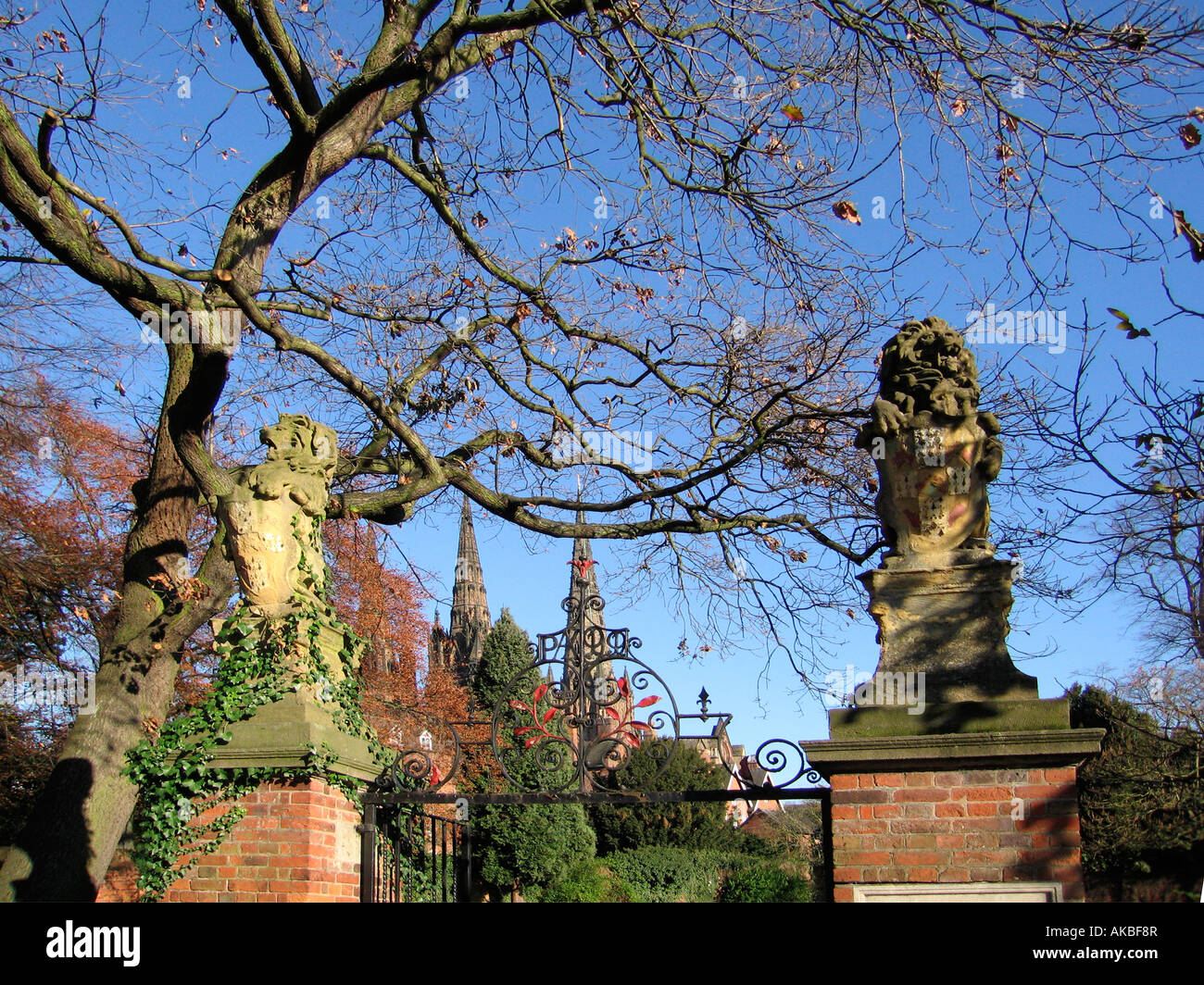 Statues of two lions guard the entrance to the Memorial Garden in Lichfield Staffordshire England Stock Photo