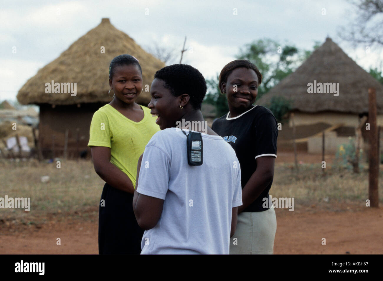 Local villagers gather around for a chit chat Stock Photo