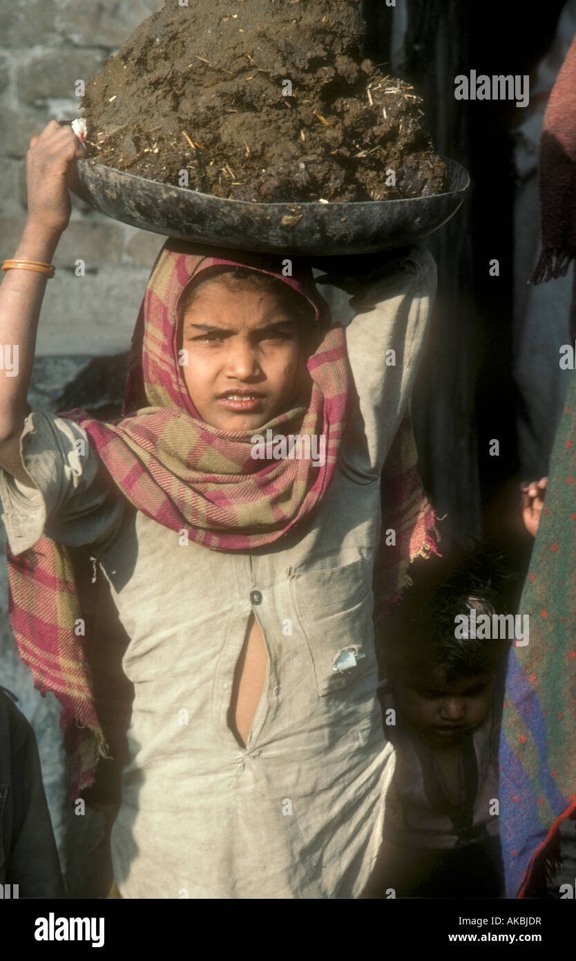 Girl with cow dung hi-res stock photography and images - Alamy