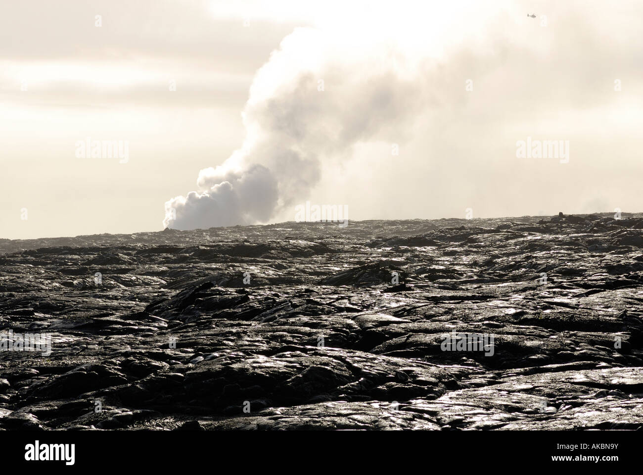 Steam from active lava flows into Pacific Ocean on Hawaii Stock Photo