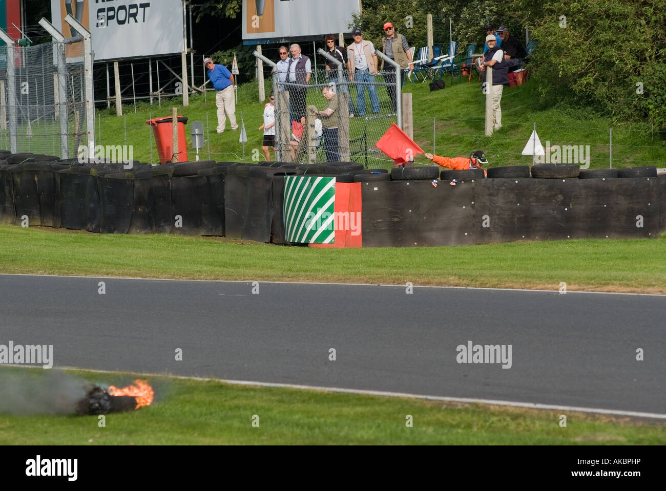 Red Flag Racetrack Red Flag Flies as Racing Car Exhaust Burns on Race Track During Motor ...