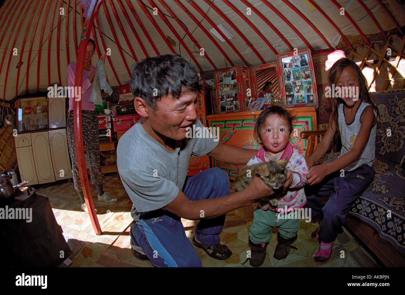 Family inside Mongolian traditional dwelling yurt. Bayankhongor aimag, Mongolia Stock Photo