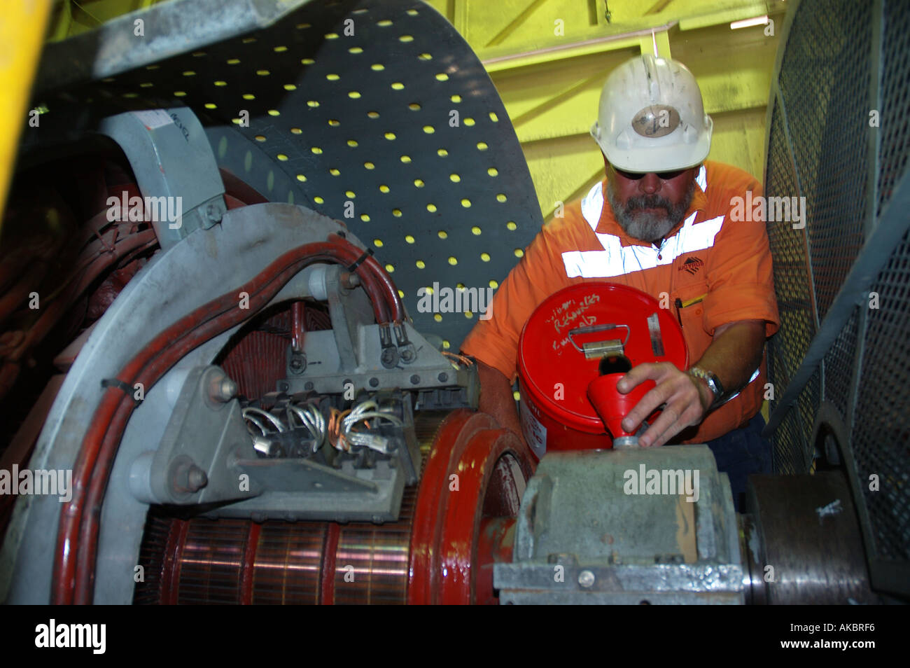 worker lubricating bearings electric motor mining dragline Central