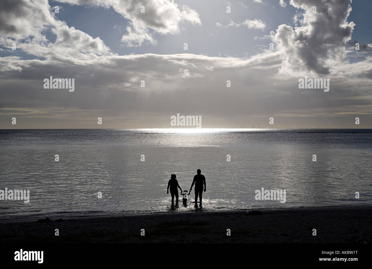 Family on beach, Mauritius Stock Photo